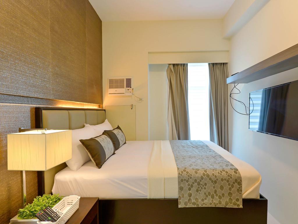 Currency Serviced Suites Manille Extérieur photo