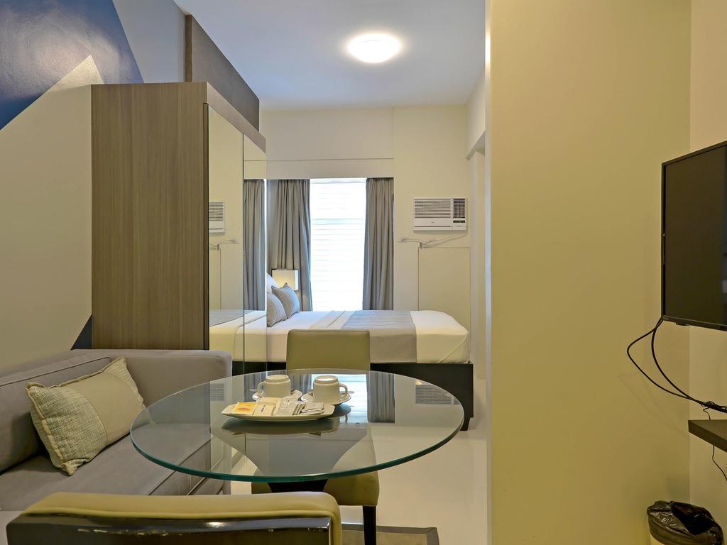 Currency Serviced Suites Manille Extérieur photo